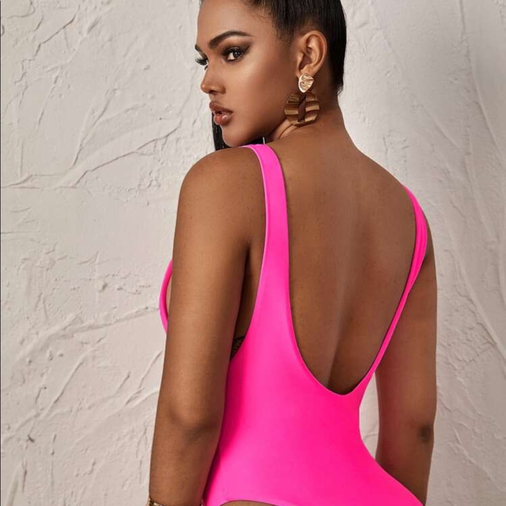 Neon pink swimsuit